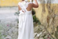 08 refined boho chic white maxi dress with ruffled criss-cross straps on the back