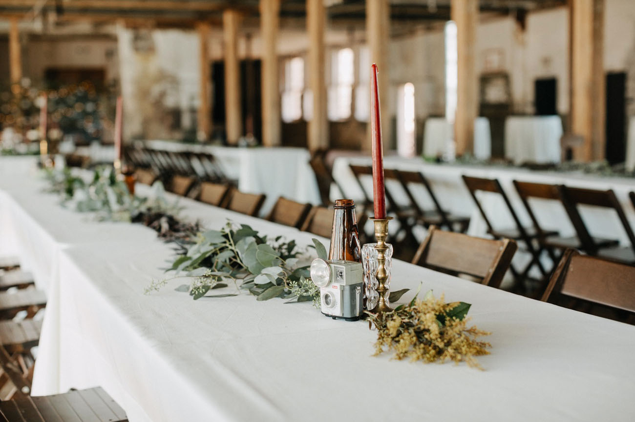 Vintage cameras and candles were used as centerpieces