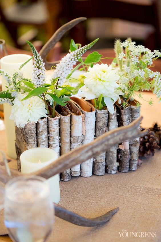 birch bark pockets with different flowers and greenery