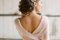 09 elegant soft rolled bridal updo with a couple of copper hairpins