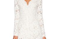 09 white lace romper with long sleeves and a V neckline