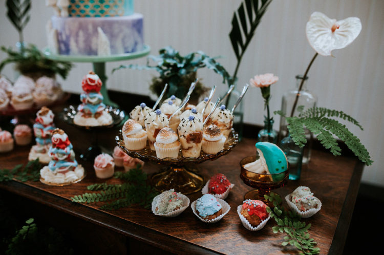 The dessert bar continued the style of the wedding with whimsy woodland touches