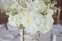 10 a birch covered vase with blush and white flowers