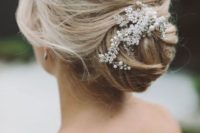 10 an elegant wedding updo hairstyle with pearl headpiece