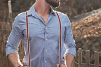 10 black pants, a chambray shirt and striped suspenders