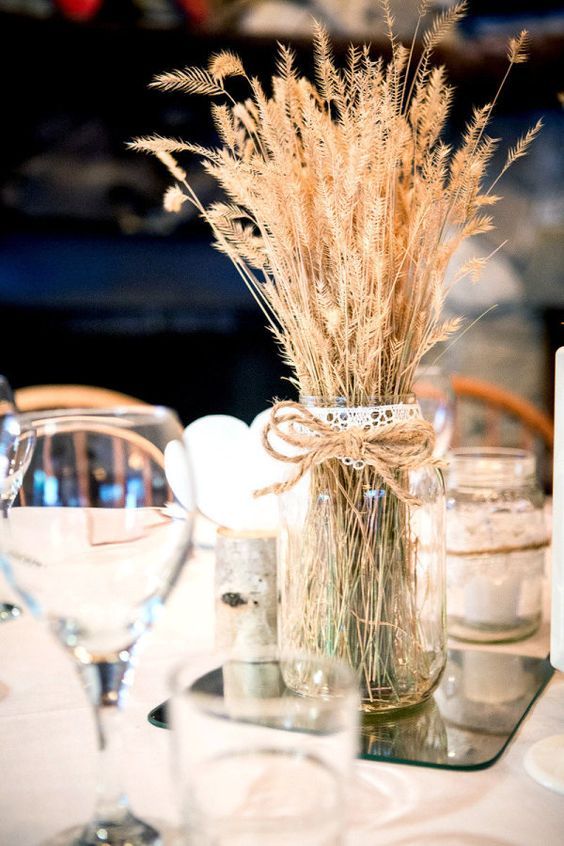 a mason jar with twine and wheat looks rustic and cute