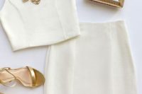 11 a plain ivory separate with a scalloped hem pencil skirt, gold jewelry and shoes