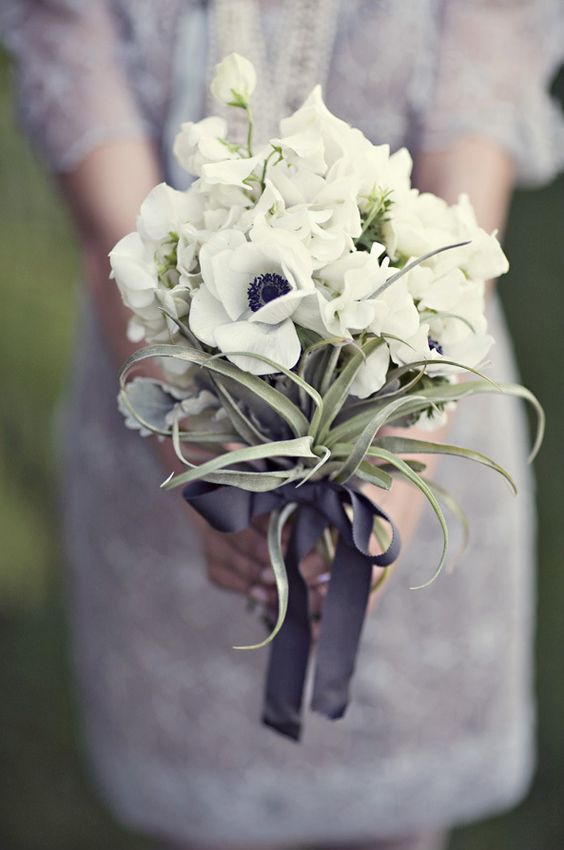 white anemones and air plants for a creative wedding bouquet