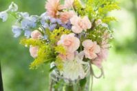 12 soft pastel floral arrangement for lining up the aisle
