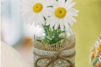 13 a mason jar with burlap and lace and camellias