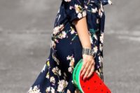 14 navy floral dress with a slit, a watermelon clutch and red heels
