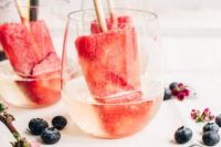 15 champagne popsicles with berries and edible flowers