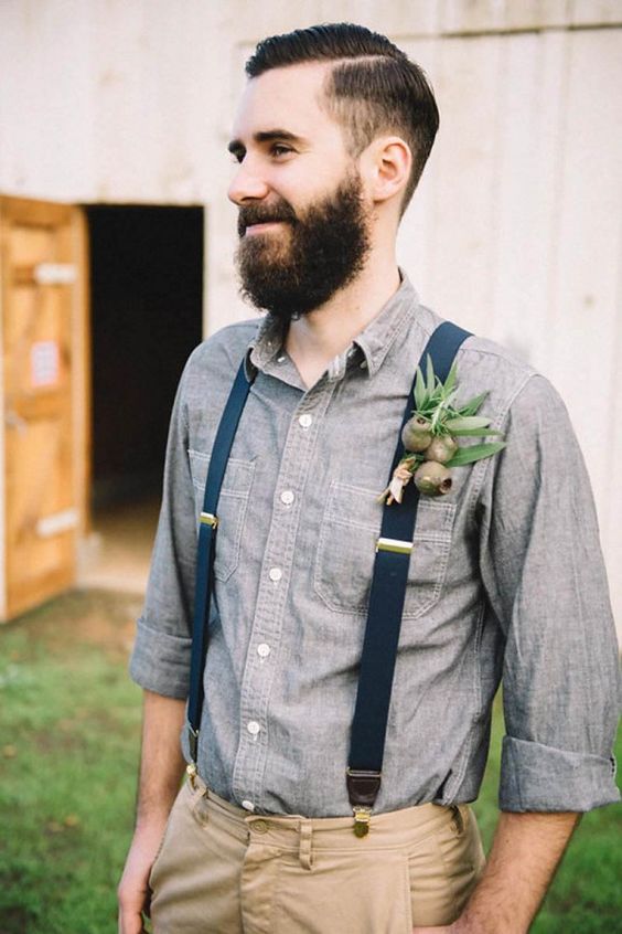 neutral pants, a chambray shirt and navy suspenders