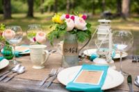 17 simple tin vases and burlap table runners are a proper idea for a camp wedding