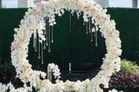 17 white and blush flower wreath with crystals hanging for a glam feel