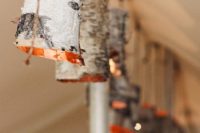 18 lamps covered with birch bark