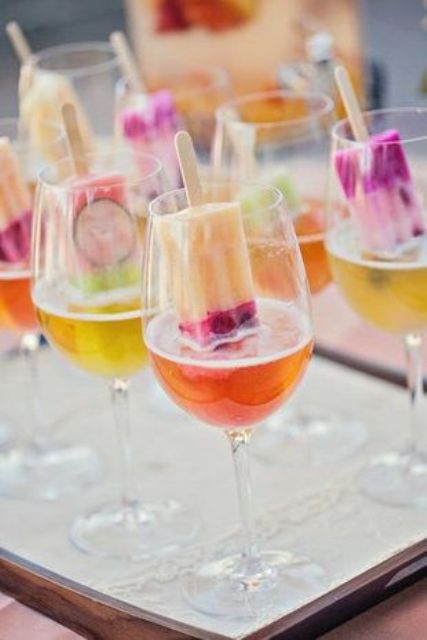 serve popsicle spritzers during your wedding cocktail hour for a fun and cool treat