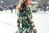 22 a green floral knee dress with sleeves and a small clutch
