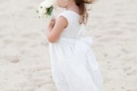 24 a white lace sleeveless dress and a white floral crown