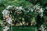 24 super lush wedding arch with lots of greenery, blush and white blooms