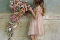 flower girl in gold shoes