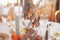 26 a cloche with butterflies and fall leaves