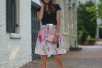 30 a black shirt, a floral pleated mini skirt, nude heels and a pink clutch