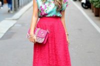 31 a hot pink lace skirt, a green with pink flowers blouse, nude Valentino heels and a bold clutch
