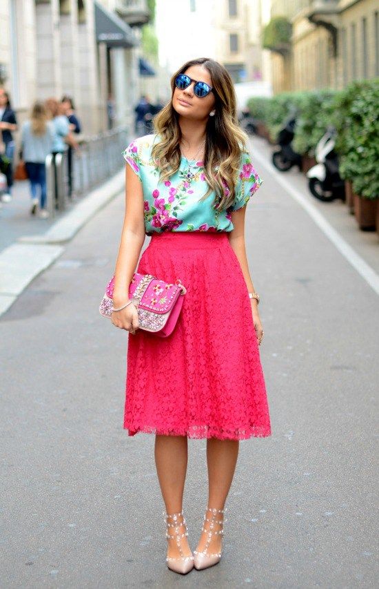 a hot pink lace skirt, a green with pink flowers blouse, nude Valentino heels and a bold clutch