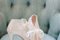 31 lace cutout booties with ribbon bows for a vintage bride