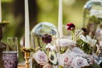 a lovely centerpiece for an enchanted forest wedding