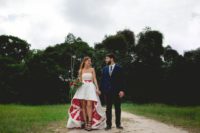 This couple consists of a musician and a painter, and their wedding was full of art and music, with 400 guests