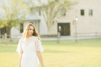 02 The bride rocking a beautiful lace spaghetti strap wedding dress with a lace capelet on it