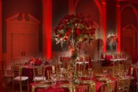 02 The reception was done in red and gold, which is decadent and chic and truly vampire-styled