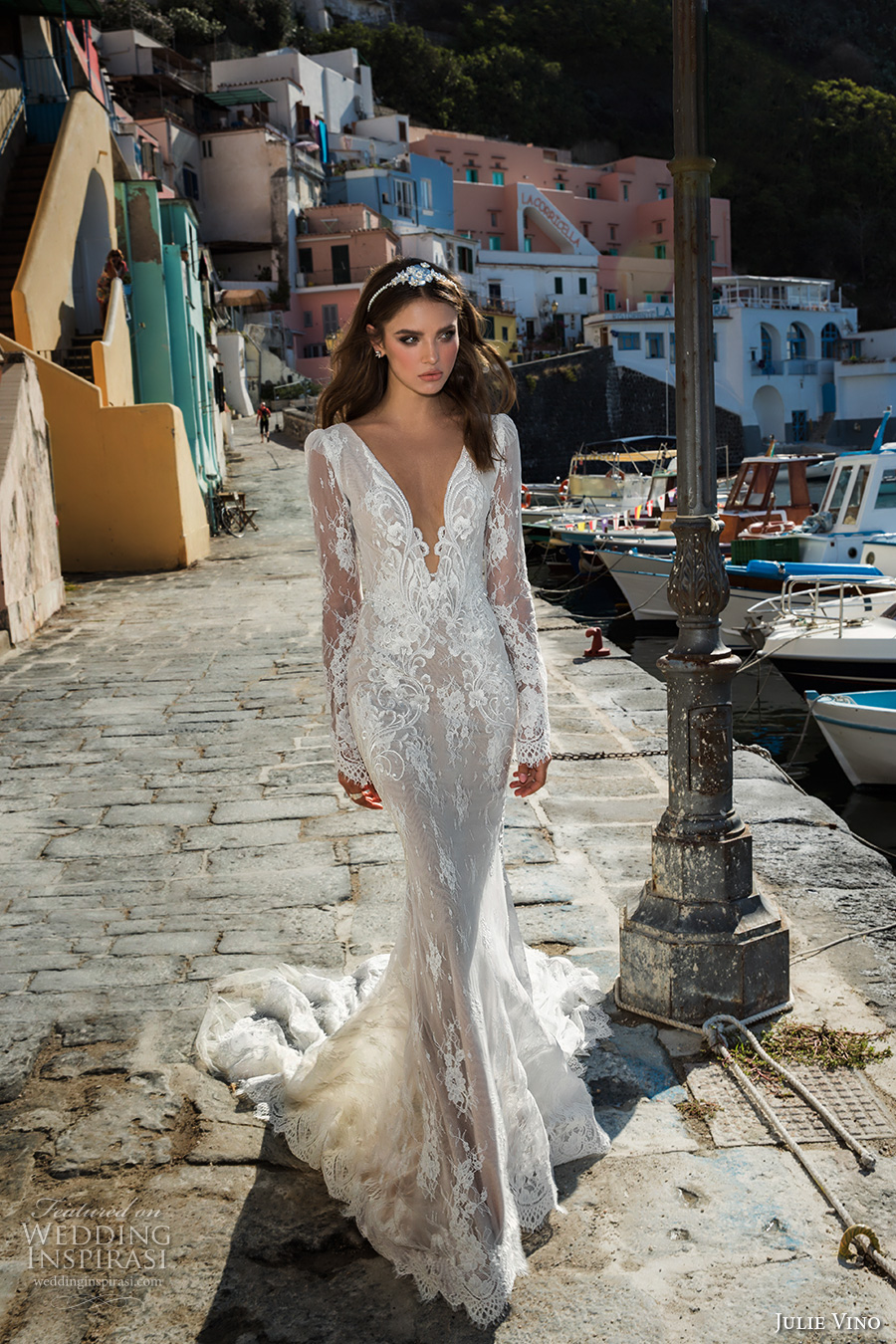 Plunging neckline long sleeves wedding dress with floral and leaf appliques, a train
