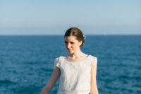 03 The bride was wearing a chic separate with a lace bodice with cap sleeves and a plain skirt topped with lace