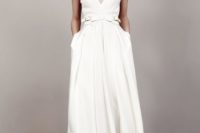 03 modern plain wedding gown with a V neckline, pockets and a white leather belt