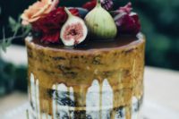 03 semi naked wedding cake with caramel drip, fresh blooms and figs
