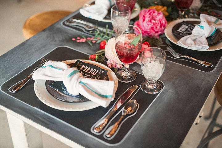 Each table setting was done with a chalkboard placemat and menu, the table itself was also chalkboard