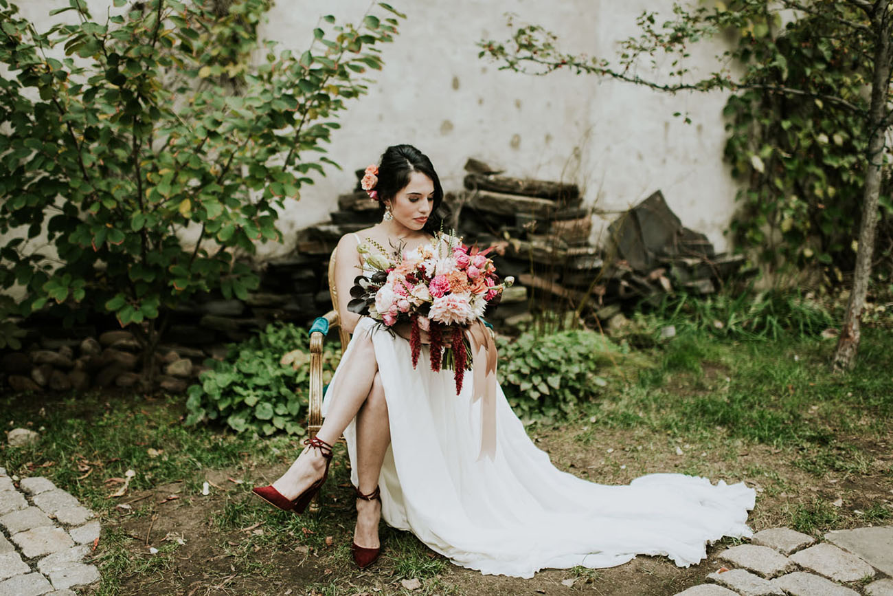 I totally love her burgundy shoes that match the bouquet
