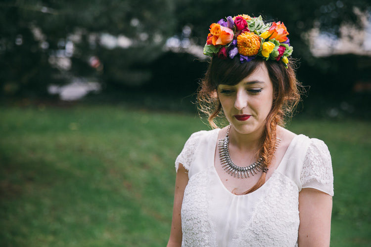 The bride rock a Frida Kahlo inspired floral crown and makeup