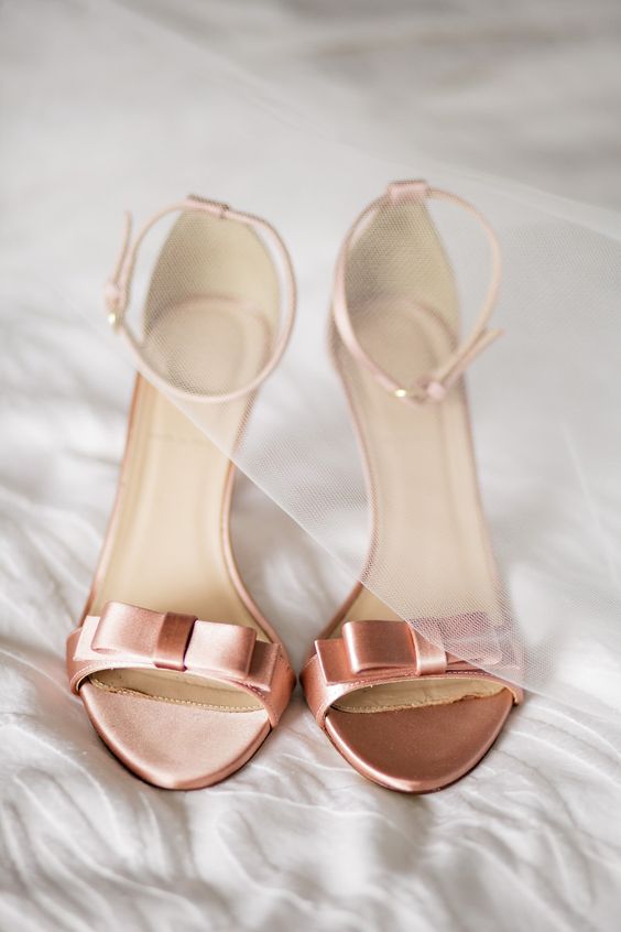 copper colored small bow heeled sandals