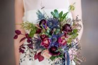 05 a wedding bouquet with thistle, burgundy and purple blooms