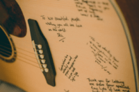 06 A guitar was used istead of a guestbook, the couple hung it on the wall at home