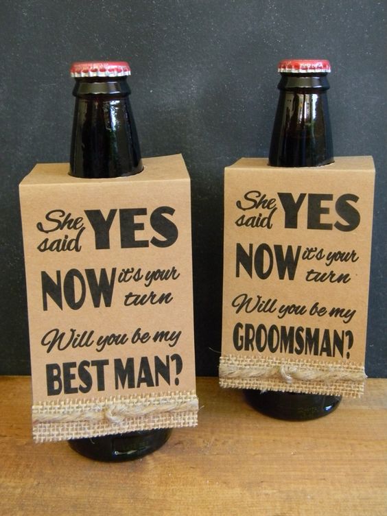 beer bottles with cardboard and burlap sign and a question
