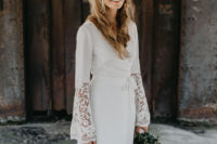 07 The bride designed her own boho-inspired dress with a V-neck and crocheted bell sleeves