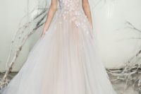 07 blush tulle ballgown with an illusion bodice and white floral appliques on the shoulders and bodice