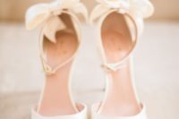 07 ivory ankle strap peep toe shoes with bows on the back