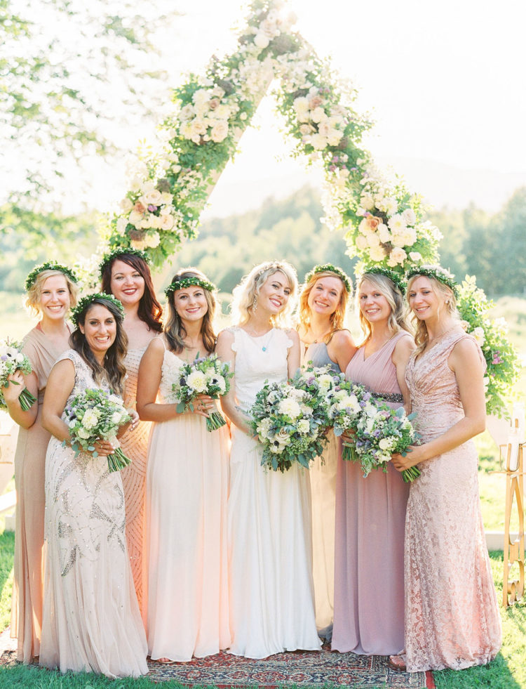 The bridesmaids were rocking mismatching pink dresses with sparkles or without