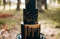 08 black wedding cake with copper drip and calligraphy